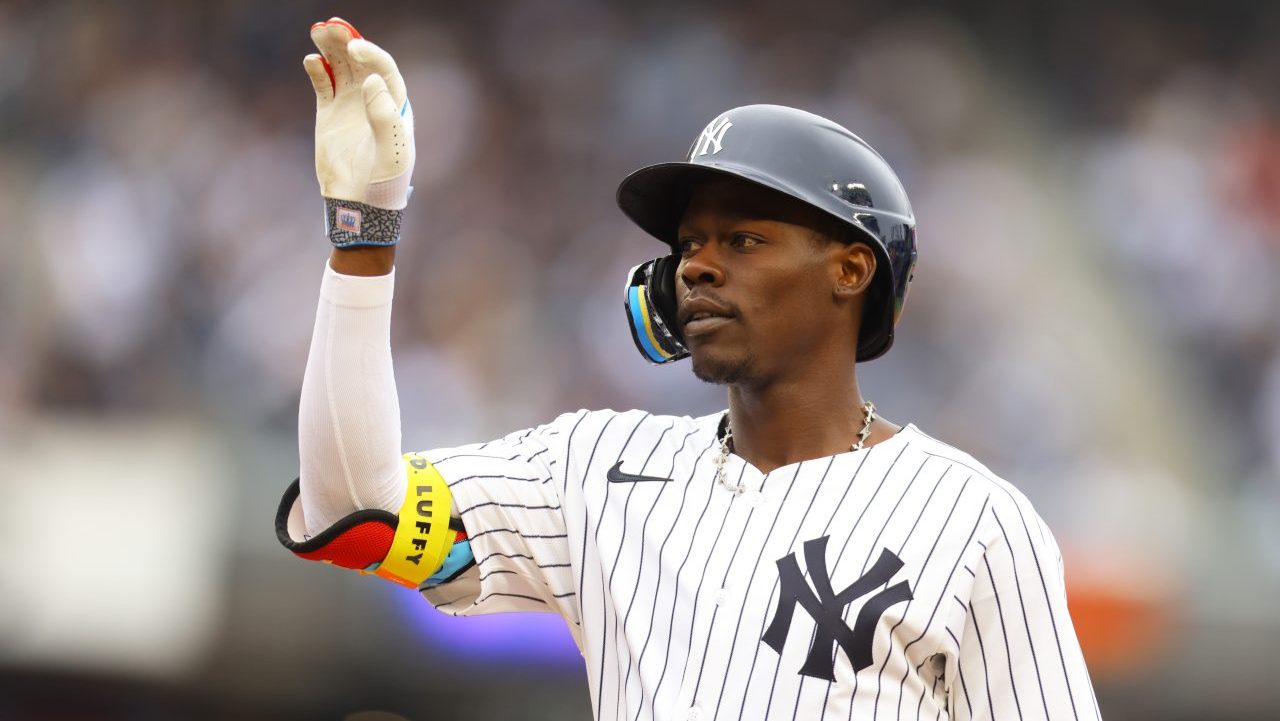 Jazz Chisholm Jr. of the New York Yankees waves to the dugout