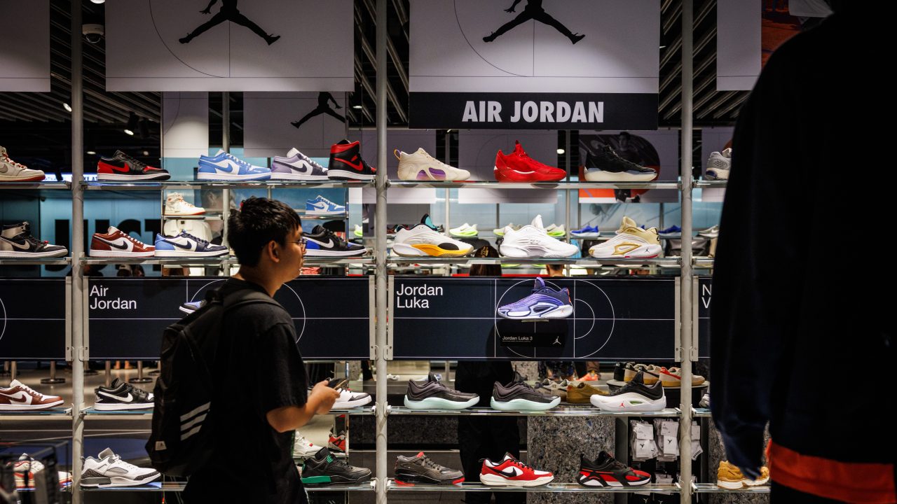 Customers browse shoes at Nike store in Thailand