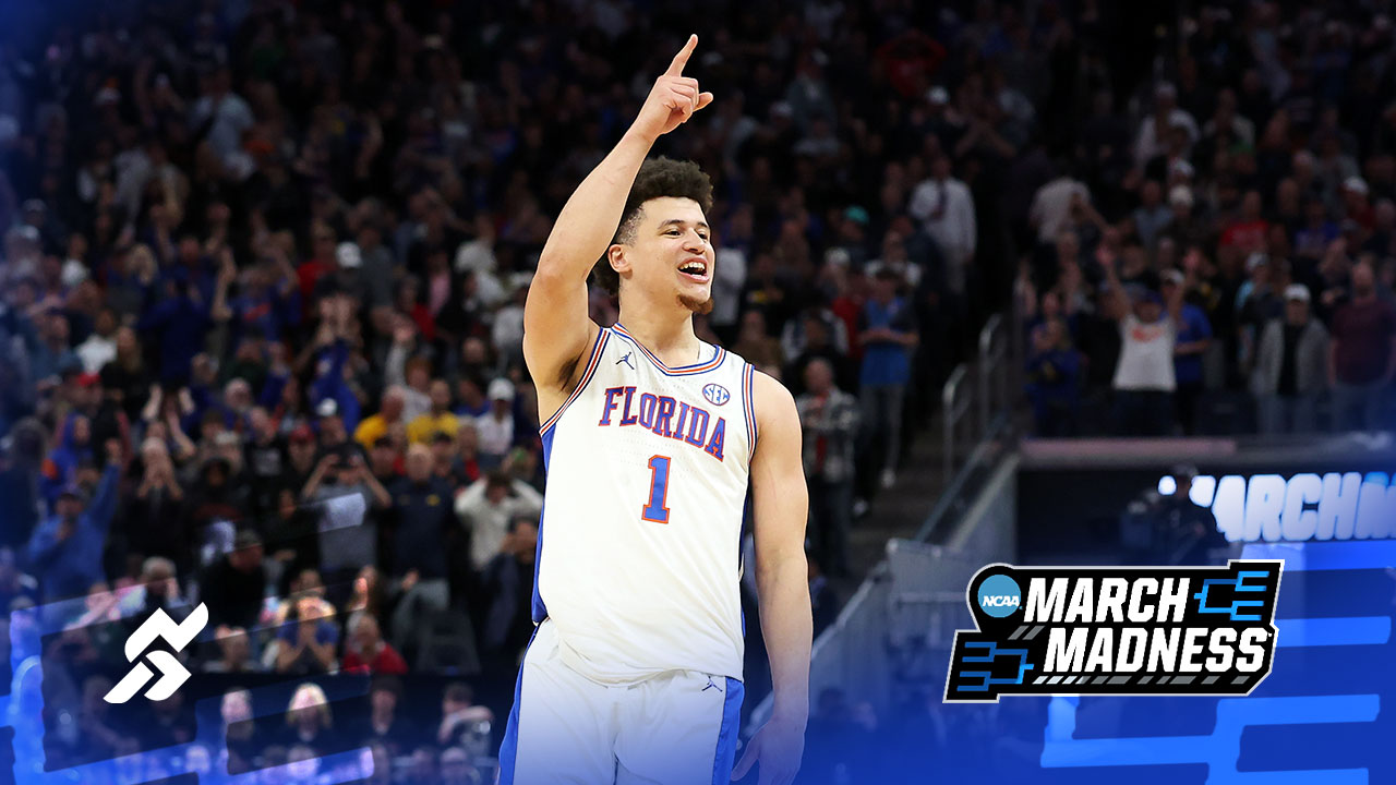 Florida's Walter Clayton Jr. points in air